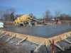 Pouring the footings and floor. Pouring the footings and floor.