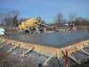 Pouring the footings and floor.