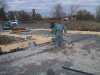Placing the plumbing under the floor. Placing the plumbing under the floor.